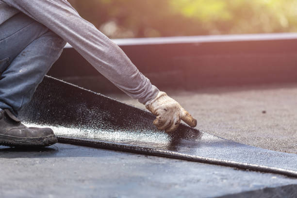 Professional Basement Waterproofing technician working in Gwynedd Valley, PA